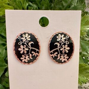 Damascene copper tone earrings with black enamel accent